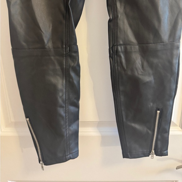 Faux leather pants with fun patterns including zippers on the bottom pant legs - Picture 3 of 7